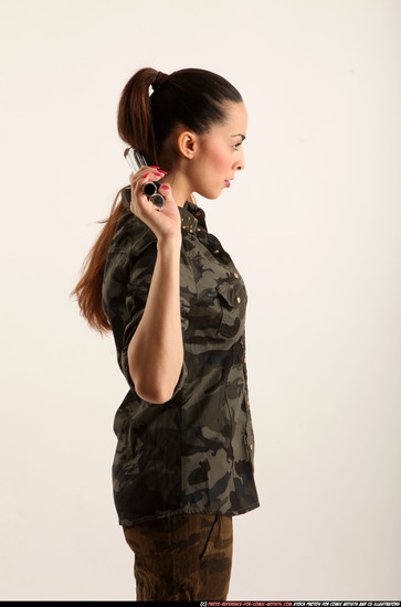 Woman Young Athletic White Standing poses Army Fighting with shotgun