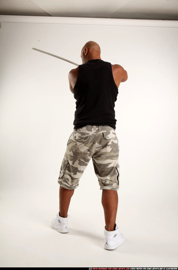 Man Adult Athletic Black Fighting with sword Standing poses Army