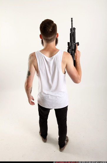 Man Adult Athletic White Fighting with submachine gun Standing poses Casual