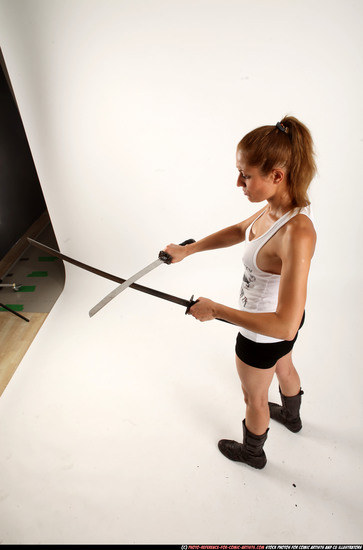 Woman Adult Athletic White Fighting with sword Standing poses Casual