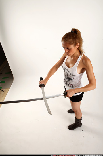 Woman Adult Athletic White Fighting with sword Standing poses Casual