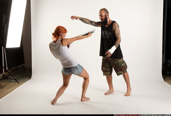 Man & Woman Adult Athletic White Moving poses Casual Fighting with shotgun