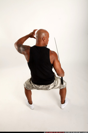 Man Adult Athletic Black Fighting with sword Standing poses Army