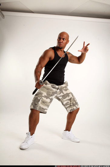 Man Adult Athletic Black Fighting with sword Standing poses Army