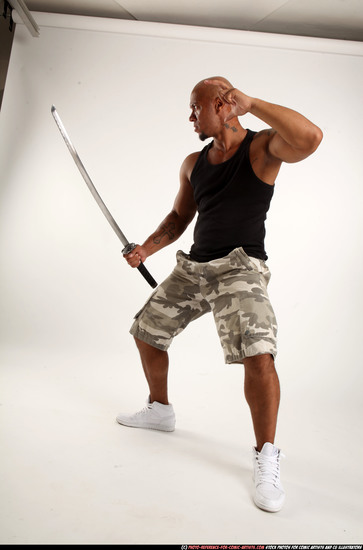 Man Adult Athletic Black Fighting with sword Standing poses Army