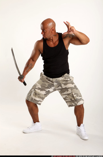 Man Adult Athletic Black Fighting with sword Standing poses Army