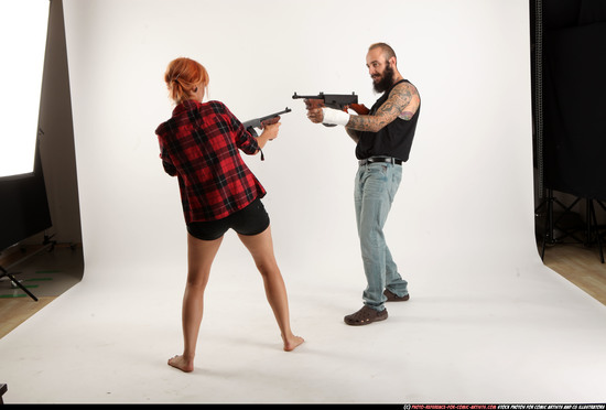 Man & Woman Adult Athletic White Fighting with submachine gun Standing poses Casual