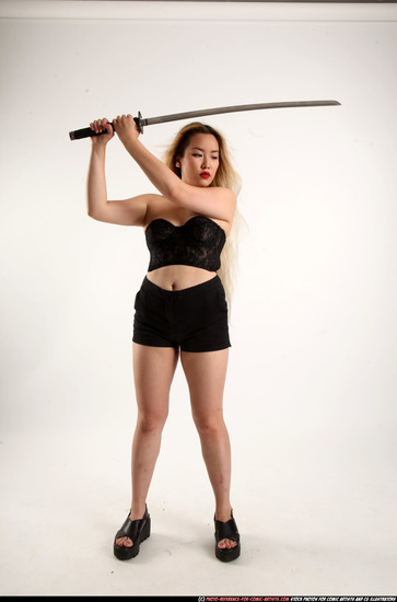 Woman Young Average Fighting with sword Standing poses Casual Asian