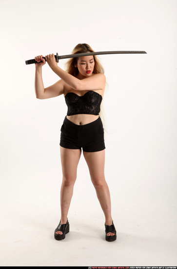 Woman Young Average Fighting with sword Standing poses Casual Asian