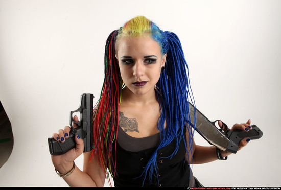 Woman Young Average White Kneeling poses Casual Fighting with shotgun