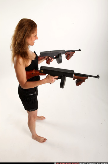 Woman Adult Athletic White Fighting with submachine gun Standing poses Casual