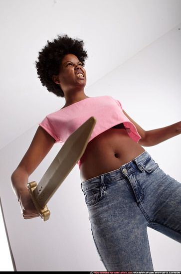 Woman Adult Athletic Black Fighting with sword Standing poses Casual