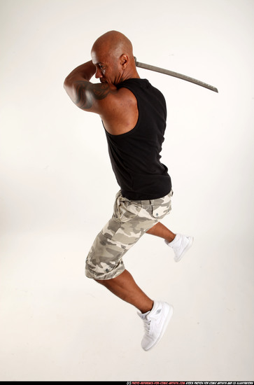 Man Adult Athletic Black Fighting with sword Moving poses Army