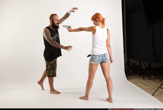 Man & Woman Adult Athletic White Fighting with gun Standing poses Sportswear