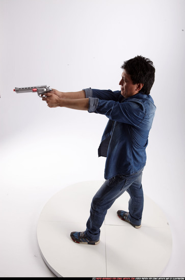 Man Adult Athletic Fighting with gun Standing poses Casual Asian