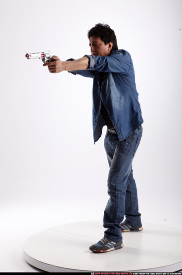 Man Adult Athletic Fighting with gun Standing poses Casual Asian