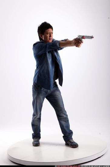 Man Adult Athletic Fighting with gun Standing poses Casual Asian