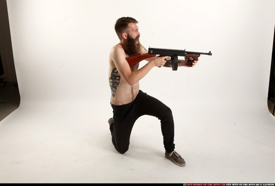 Man Adult Athletic White Fighting with submachine gun Kneeling poses Pants