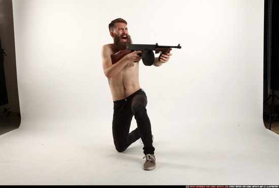 Man Adult Athletic White Fighting with submachine gun Kneeling poses Pants