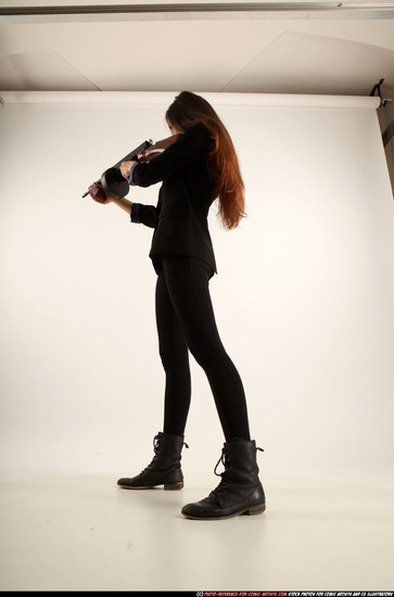 Woman Young Athletic White Fighting with submachine gun Standing poses Business