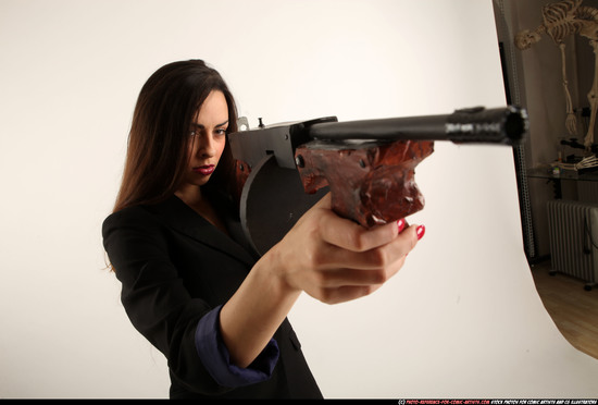 Woman Young Athletic White Fighting with submachine gun Standing poses Business