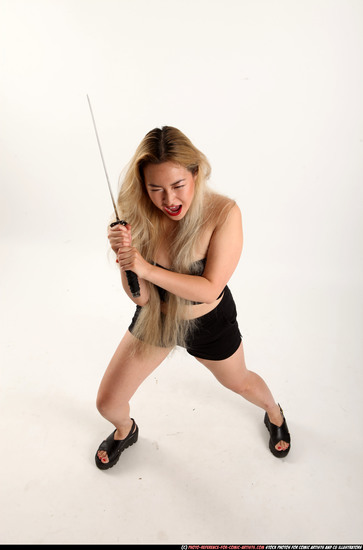 Woman Young Average Fighting with sword Standing poses Casual Asian