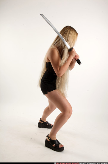 Woman Young Average Fighting with sword Standing poses Casual Asian