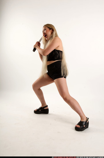 Woman Young Average Fighting with sword Standing poses Casual Asian