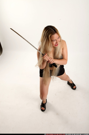 Woman Young Average Fighting with sword Standing poses Casual Asian