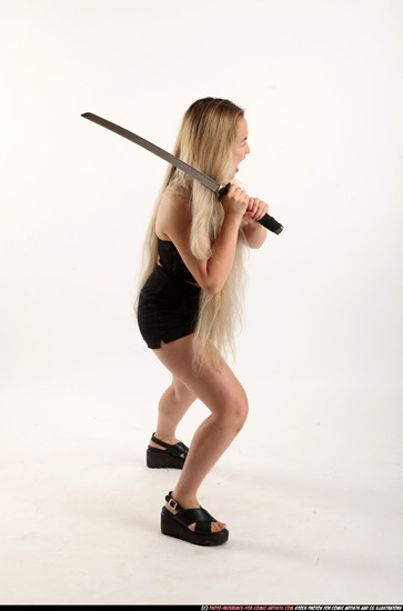 Woman Young Average Fighting with sword Standing poses Casual Asian