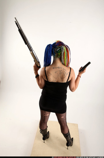 Woman Young Average White Fighting with gun Standing poses Casual