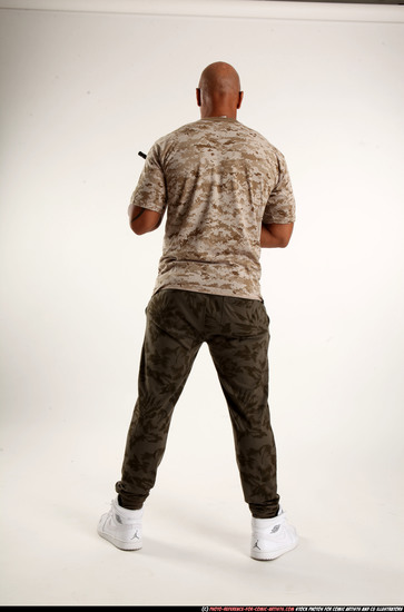 Man Adult Athletic Black Fighting with submachine gun Standing poses Army