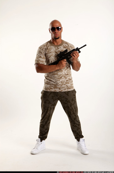 Man Adult Athletic Black Fighting with submachine gun Standing poses Army