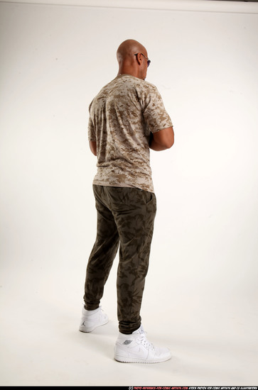 Man Adult Athletic Black Fighting with submachine gun Standing poses Army