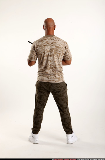 Man Adult Athletic Black Fighting with submachine gun Standing poses Army