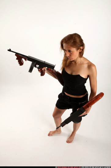 Woman Adult Athletic White Fighting with submachine gun Standing poses Casual