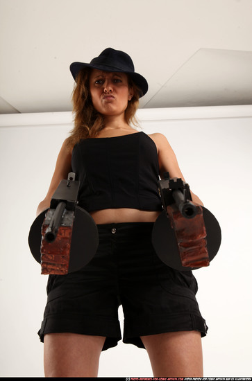 Woman Adult Athletic White Fighting with submachine gun Standing poses Casual