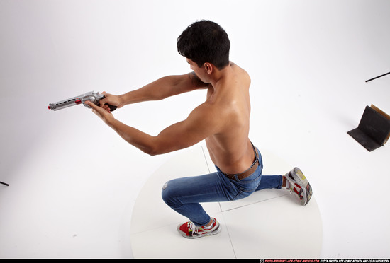 Man Adult Athletic White Fighting with gun Kneeling poses Pants