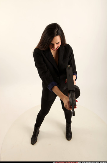 Woman Young Athletic White Fighting with submachine gun Standing poses Business