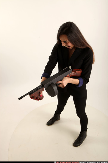 Woman Young Athletic White Fighting with submachine gun Standing poses Business