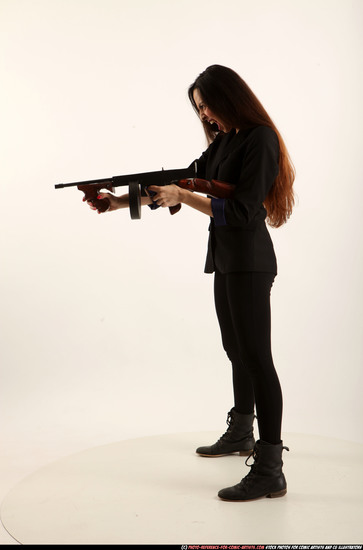 Woman Young Athletic White Fighting with submachine gun Standing poses Business