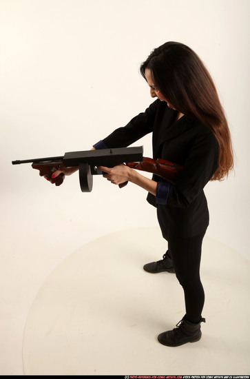 Woman Young Athletic White Fighting with submachine gun Standing poses Business