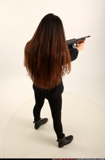 Woman Young Athletic White Fighting with submachine gun Standing poses Business