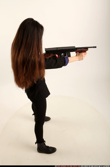 Woman Young Athletic White Fighting with submachine gun Standing poses Business