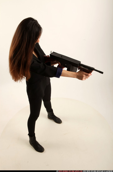 Woman Young Athletic White Fighting with submachine gun Standing poses Business