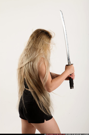 Woman Young Average Fighting with sword Standing poses Casual Asian