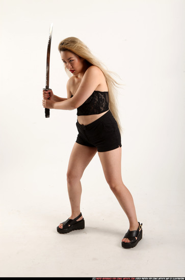 Woman Young Average Fighting with sword Standing poses Casual Asian