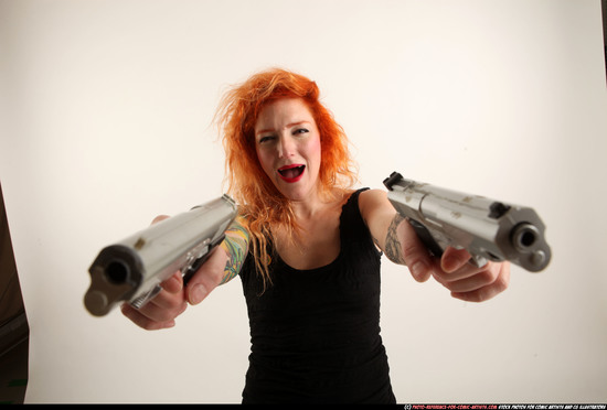 Woman Adult Athletic White Fighting with gun Standing poses Casual