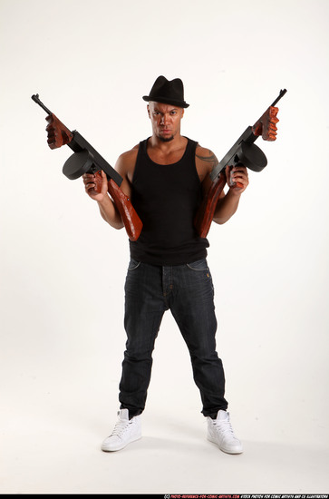 Man Adult Athletic Black Fighting with submachine gun Standing poses Casual