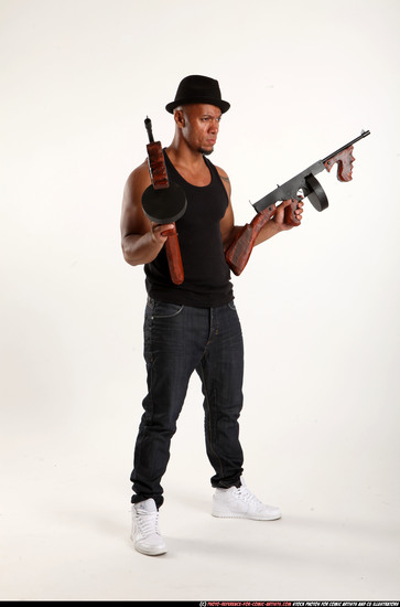 Man Adult Athletic Black Fighting with submachine gun Standing poses Casual